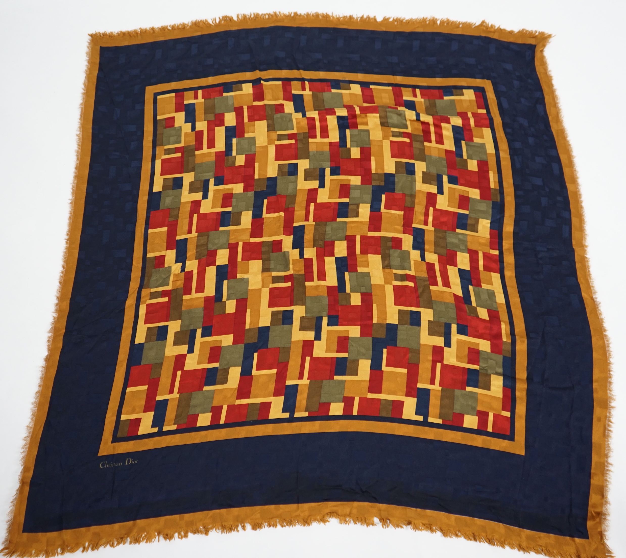 A selection of Yves Saint Laurent, two Christian Dior, Richel and Loewe silk scarves, YSL, 83cm x 85cm Christian Dior: 84cm x 80cm Richel: 87cm x 87cm Loewe: 86cm x 82cm Christian Dior large scarf 120cm x 130cm approx.